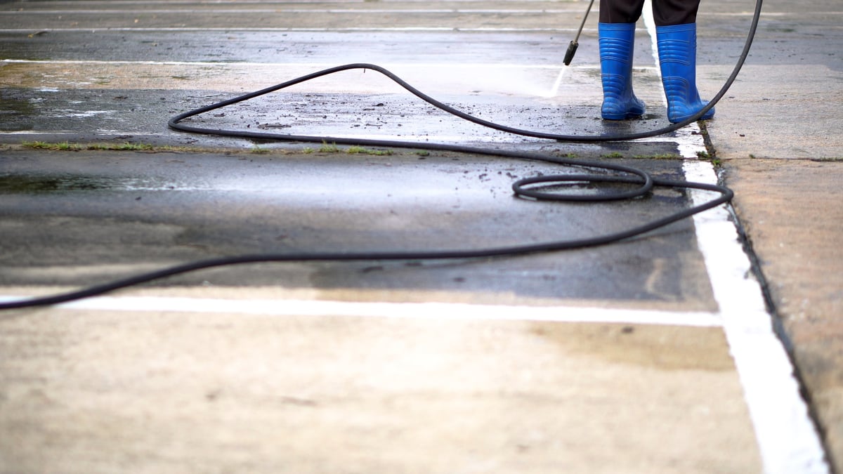 Clean concrete sidewalk walkway pressure washing